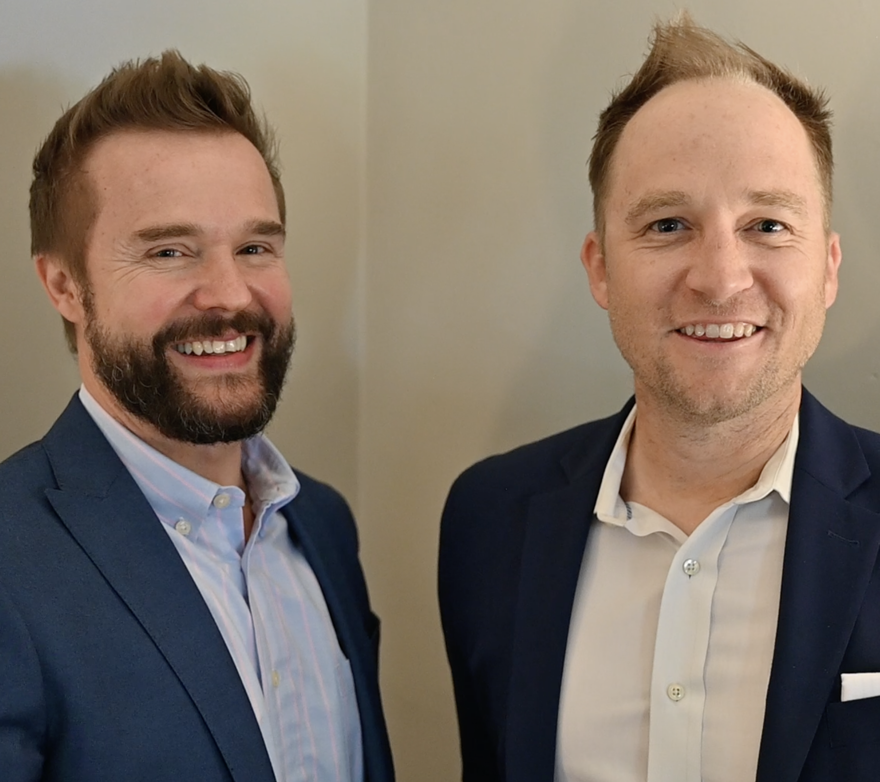 Portrait image of the two Christian Injury Law partners, Ryan Reavis and Brandon Smith